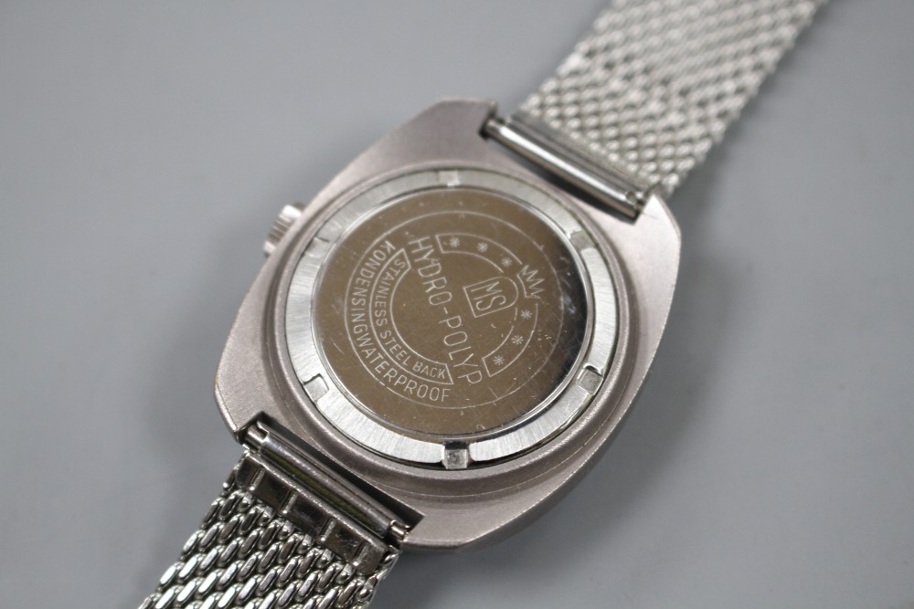 A gentlemans stainless steel Edele manual wind wrist watch, with Roman dial, on mesh link stainless steel bracelet.